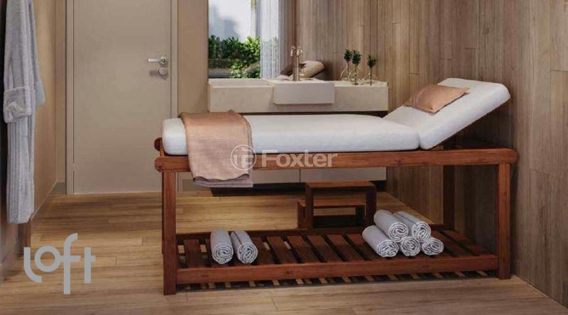 quarto-de-spa-com-maca-de-massagem-de-madeira.jpeg