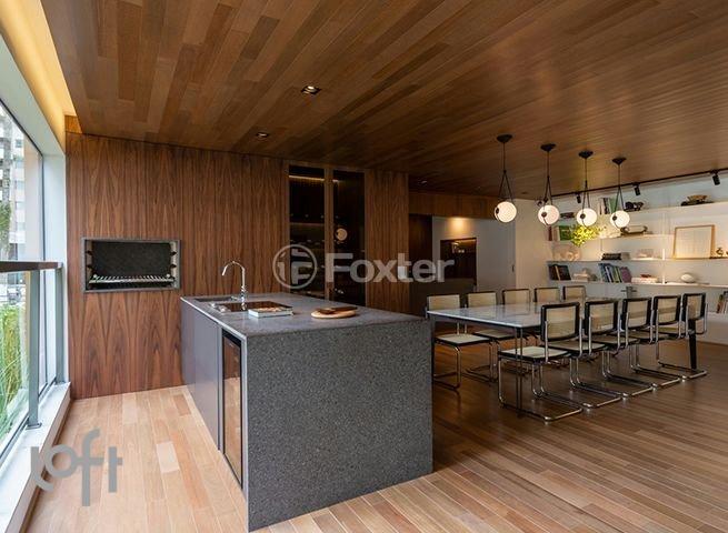 cozinha-moderna-com-ilha-central-e-mesa-de-jantar.jpeg