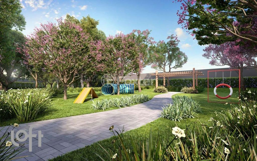 playground-acessivel-com-grama-verde-e-piso-de-concreto