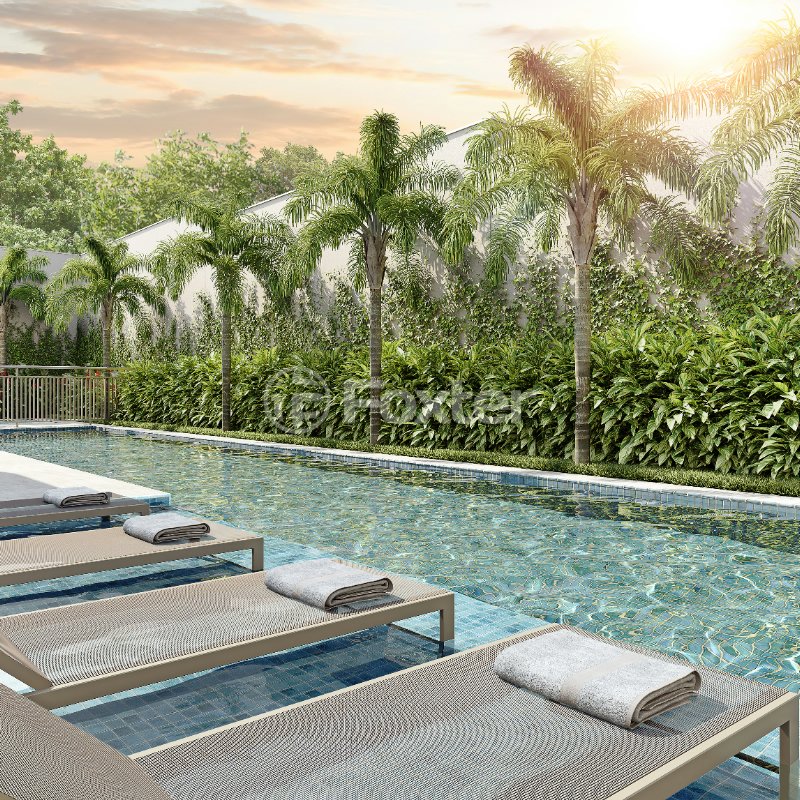 area-de-lazer-com-piscina-e-espreguicadeiras