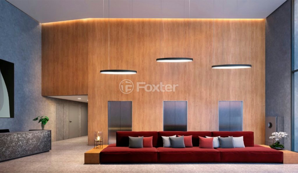 lobby-moderno-com-sofa-vermelho-e-iluminacao-natural