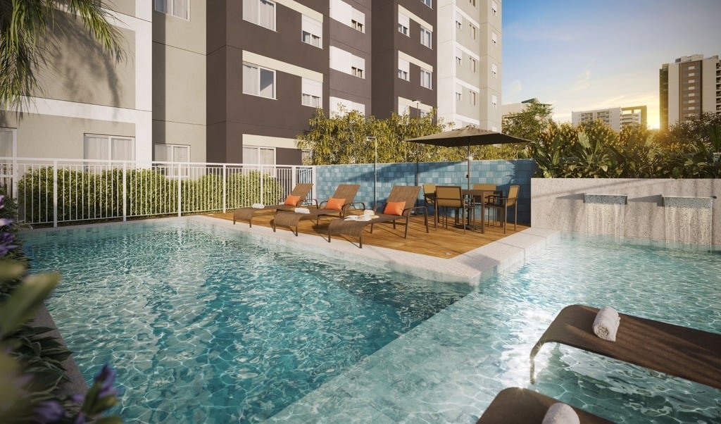 Piscina adulto com deck molhado e cascatas