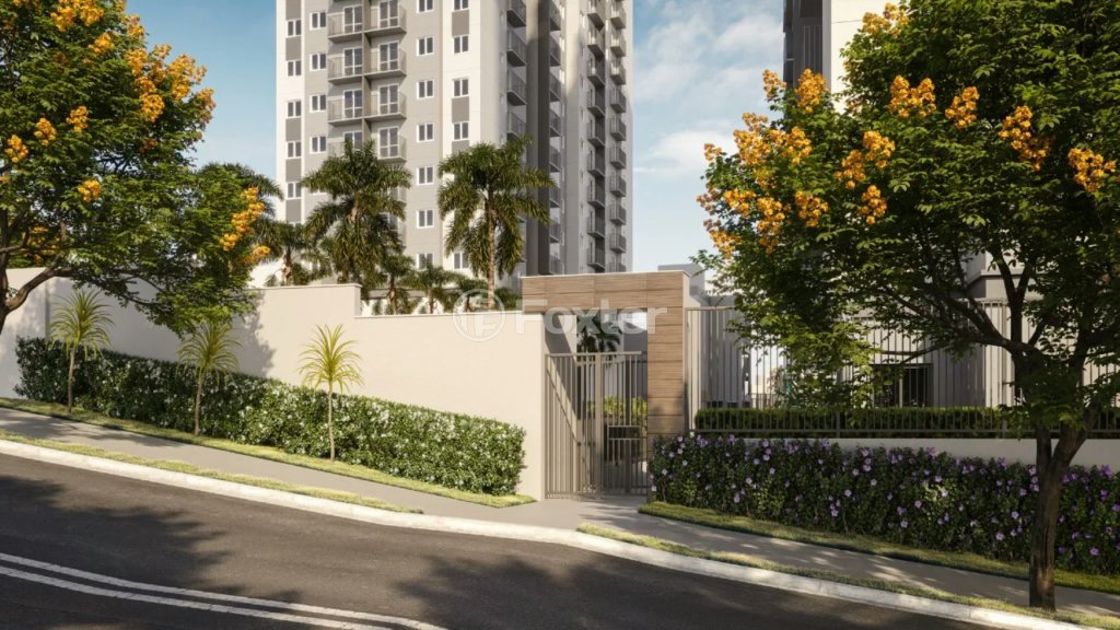 entrada-do-condominio-com-portao-de-metal-e-jardim
