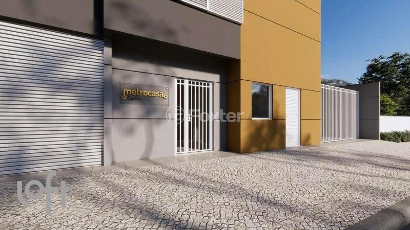 entrada-do-predio-com-portao-de-metal