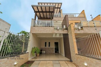 house em Rua Danton Krás Borges, Guarujá - Porto Alegre - RS