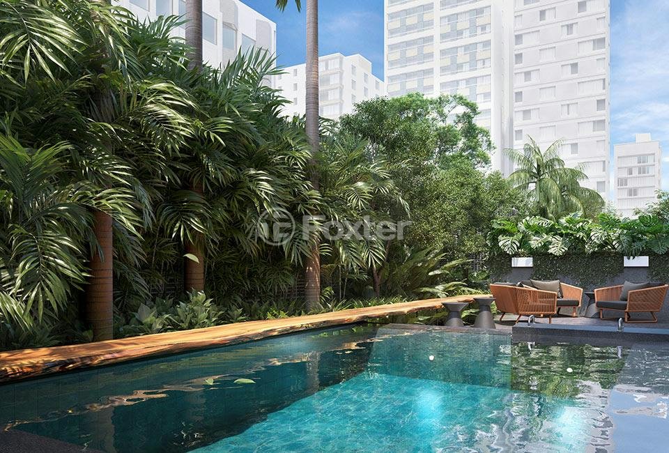 piscina-com-deck-de-madeira-e-vista-para-o-jardim-tropical.jpeg