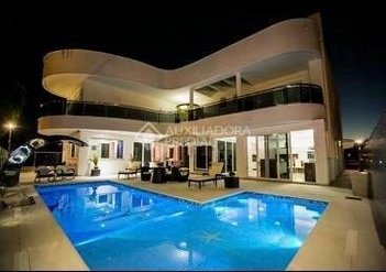 house em Rua das Caraúnas, Jurerê Internacional - Florianópolis - SC