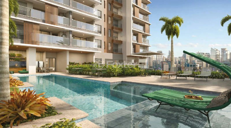 piscina-com-espreguicadeiras-e-vista-para-o-predio