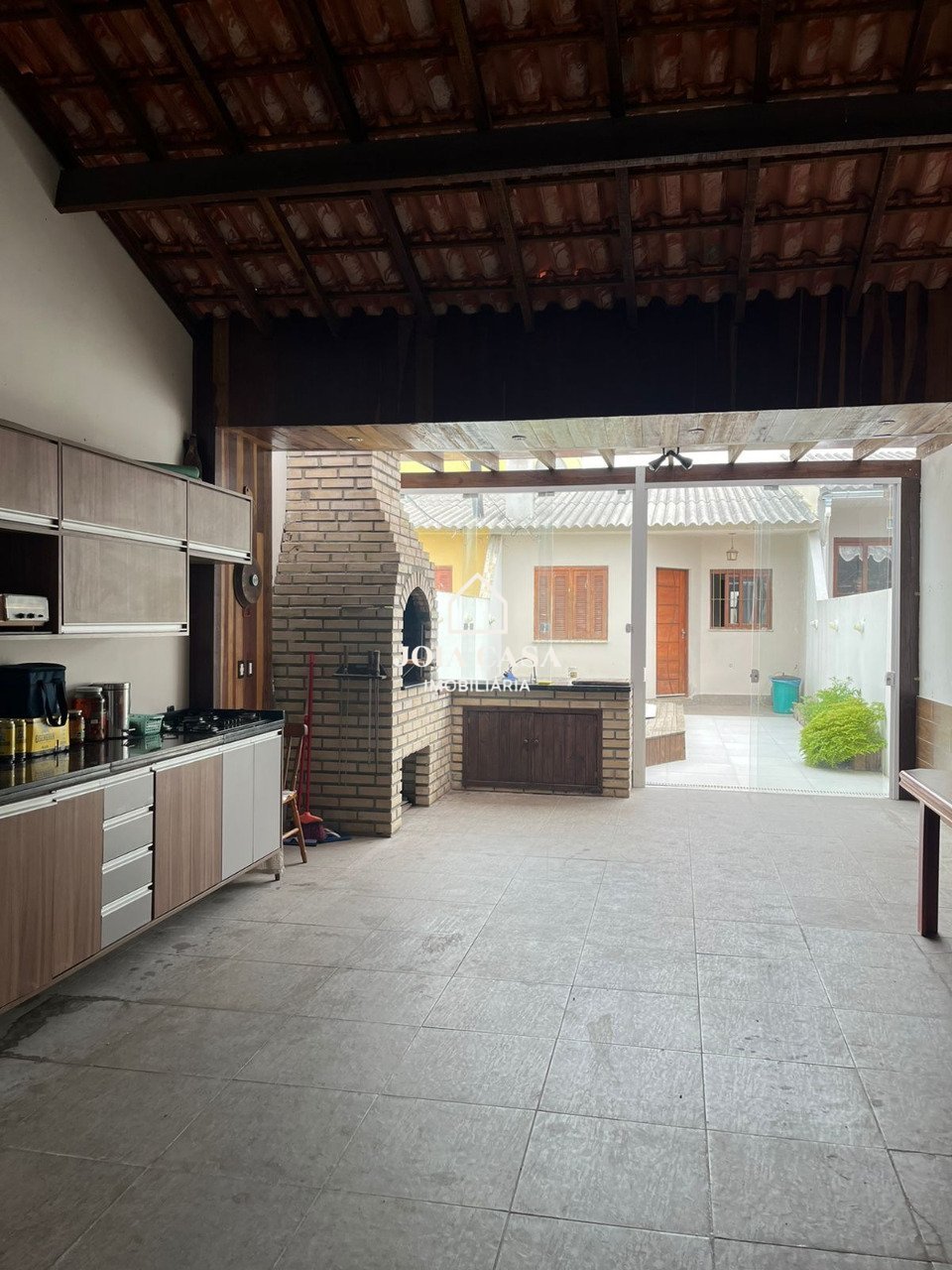 garagem com churrasqueira