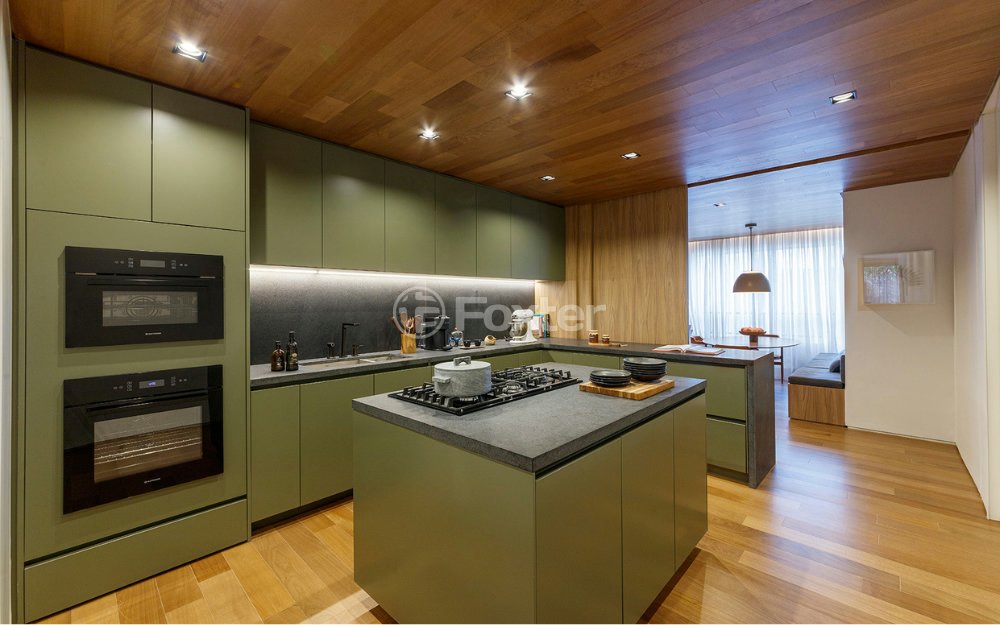 cozinha-moderna-com-ilha-central-e-armarios-verdes