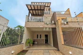 house em Rua Danton Krás Borges, Guarujá - Porto Alegre - RS