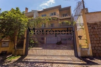 house em Isidoro Tressi, Jardim Botânico - Porto Alegre - RS