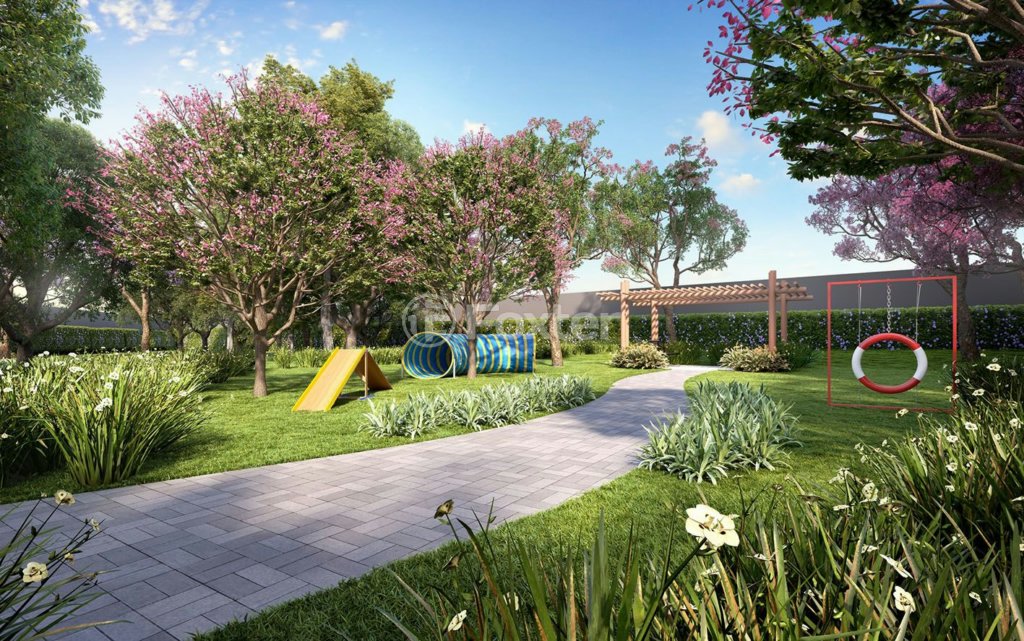 playground-acessivel-com-grama-verde-e-piso-de-concreto