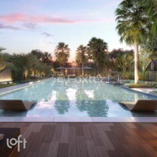 piscina-com-deck-de-madeira-e-paisagismo-tropical