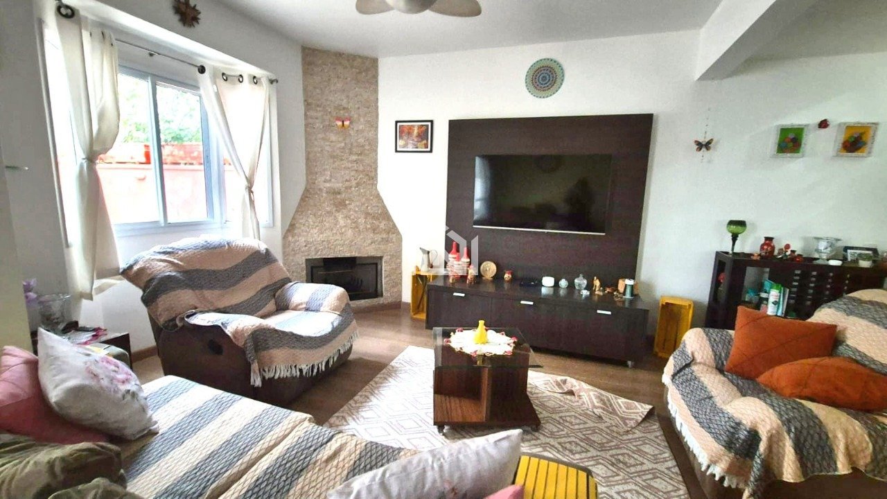 casa a venda quinta da aldeia - living