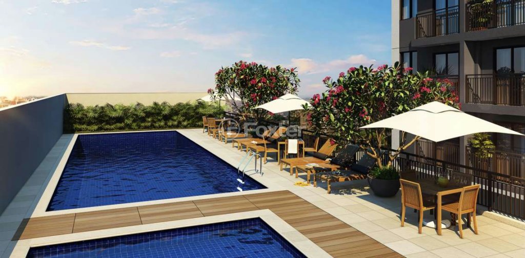 area-de-lazer-com-piscina-e-deck-de-madeira.jpeg