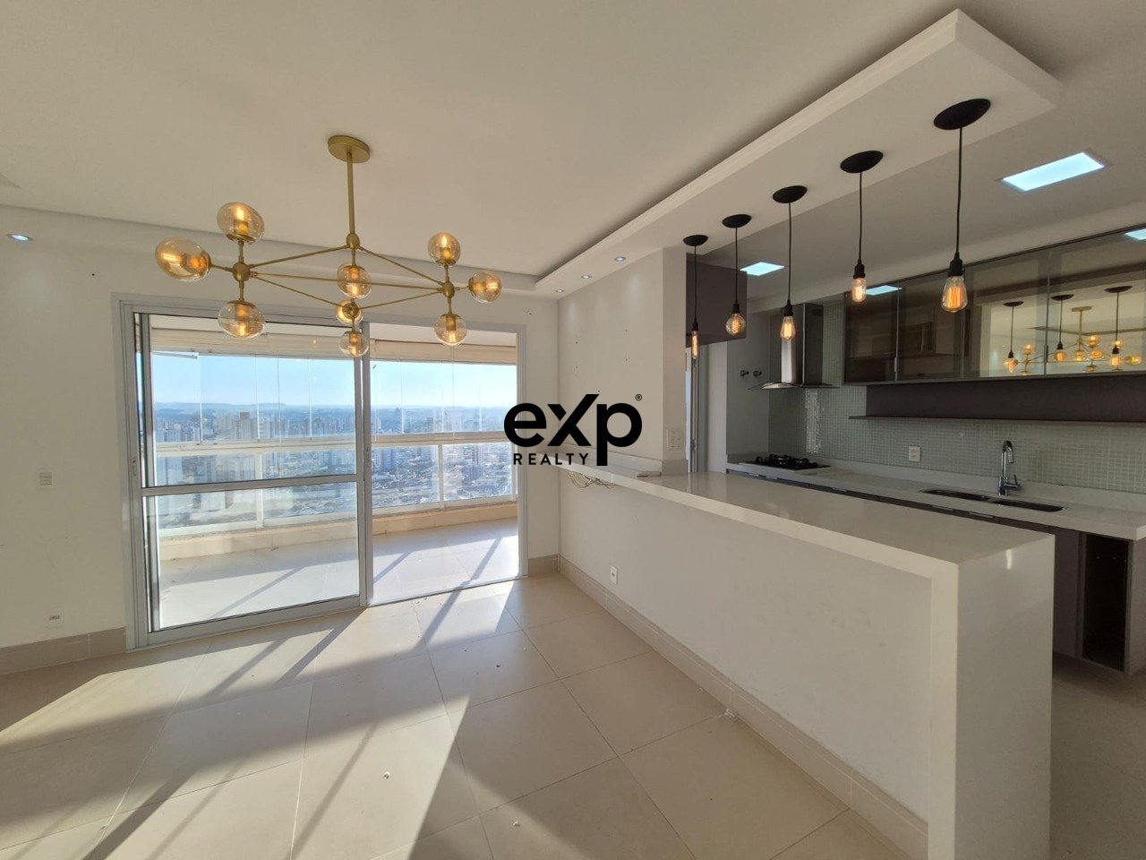 Sala integrada a cozinha americana